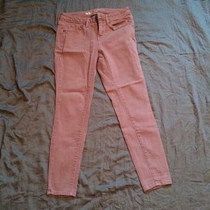 Blush pink skinny jeans